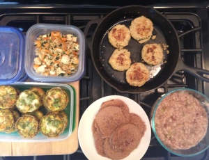 Final products featuring portioned out Veggie-Tofu bake, Egg Cakes, Garlicky-Parmesan Quinoa Patties, Nutty Quinoa Pancakes and Apple-Oatmeal